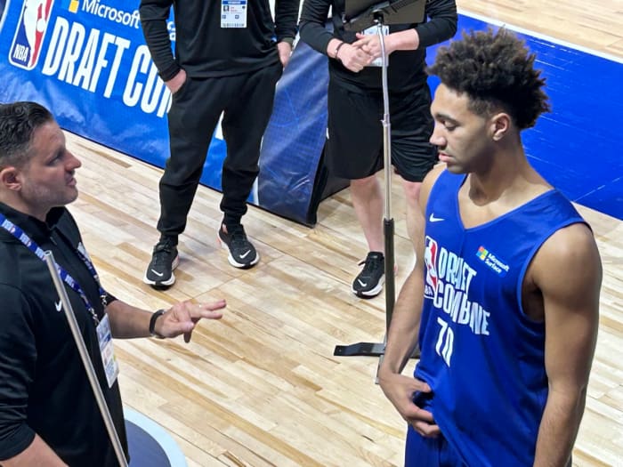Trayce Jackson-Davis gets instructions before a vertical leap test during the NBA Draft Combine on Monday in Chicago. (HoosiersNow.com photo by Tom Brew)